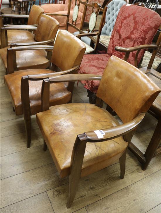 Four French leather Deco style chairs